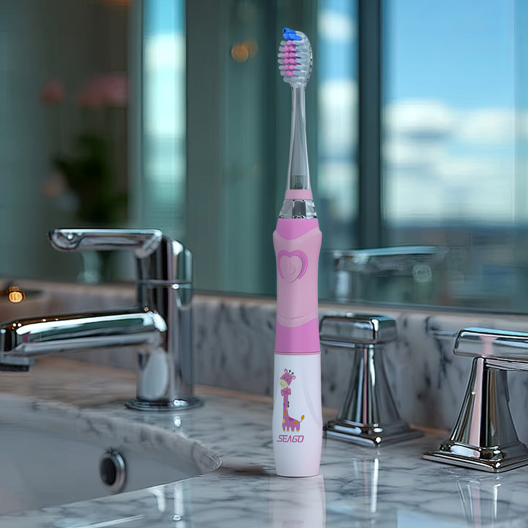 SEAGO Cepillo Dental Sónico Infantil, Color Rosa, 1xAA 1,5V (no incluido), 3 Puntas de Repuesto, SG-977 Rosa