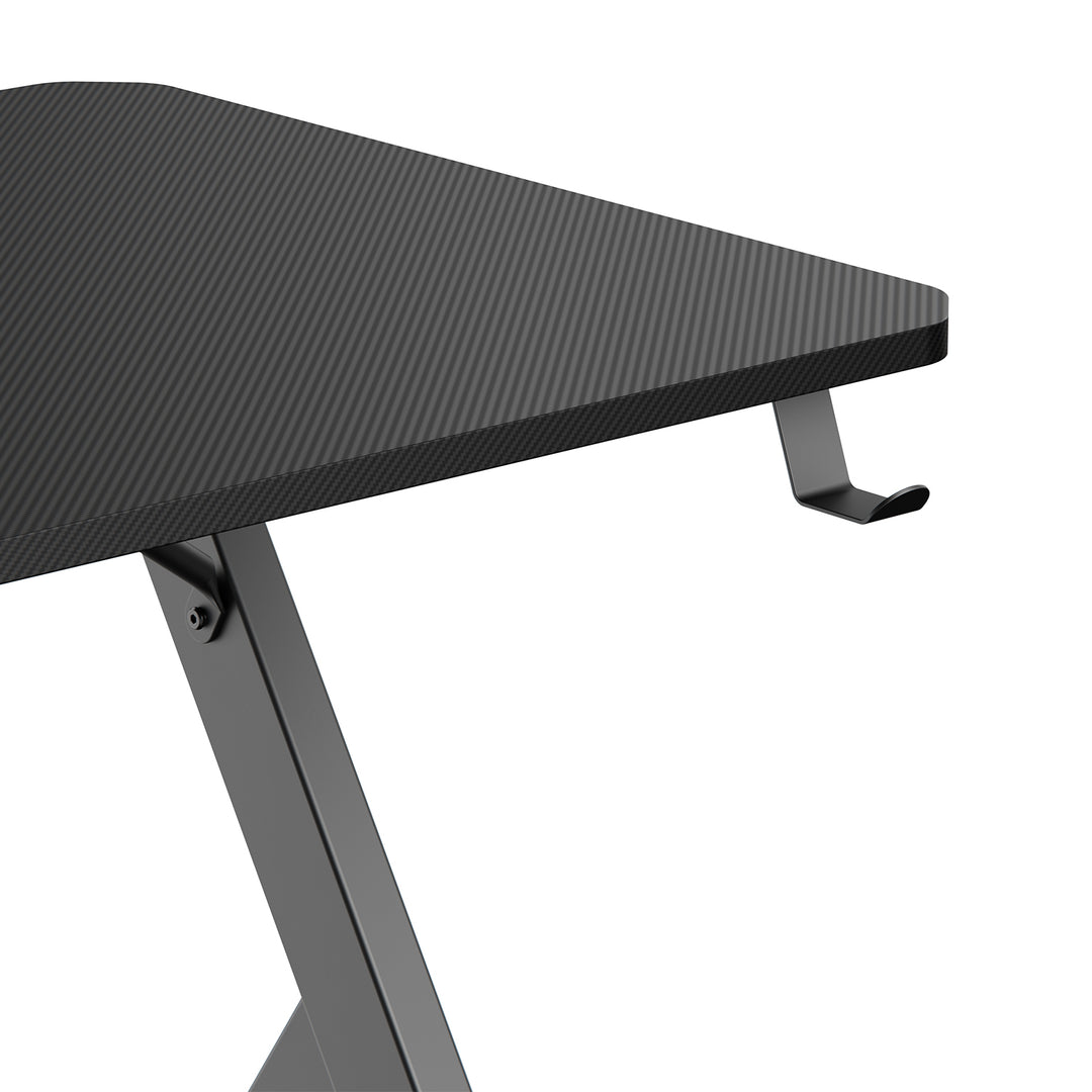Escritorio para juegos NanoRS, negro, con soporte para auriculares y vasos, max. 75kg, dimensiones 1200x600x750mm, RS101