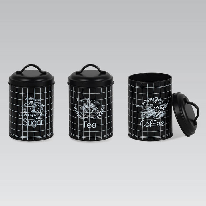 Conjunto de 3 latas metálicas para guardar açúcar, café e chá na cozinha.