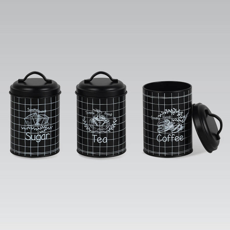 Conjunto de 3 latas metálicas para guardar açúcar, café e chá na cozinha.