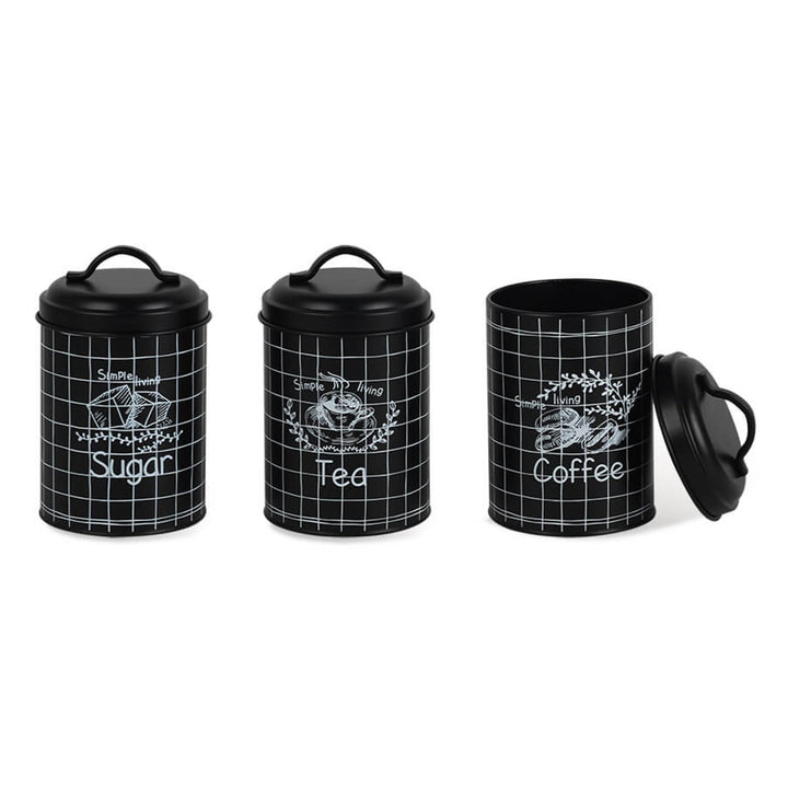 Conjunto de 3 latas metálicas para guardar açúcar, café e chá na cozinha.